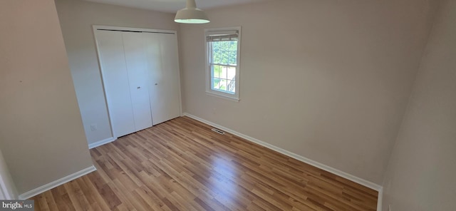 3478 Pence Ct, Annandale, VA 22003 - unfurnished bedroom featuring light wood-style floors and a closet