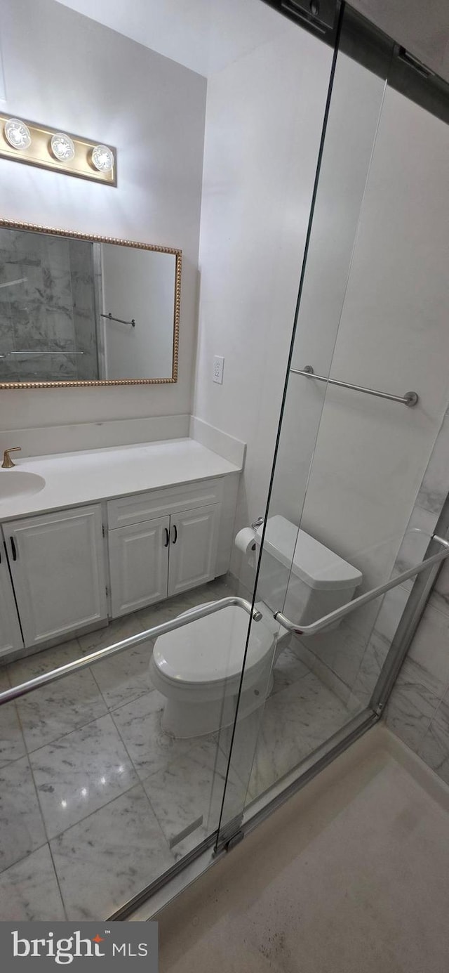 3478 Pence Ct, Annandale, VA 22003 - bathroom with vanity and marble finish floors
