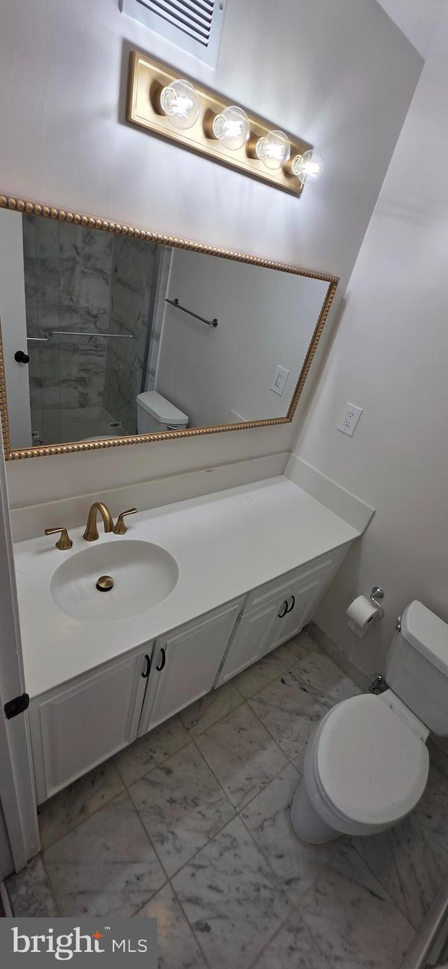 3478 Pence Ct, Annandale, VA 22003 - bathroom with marble look tiles and vanity