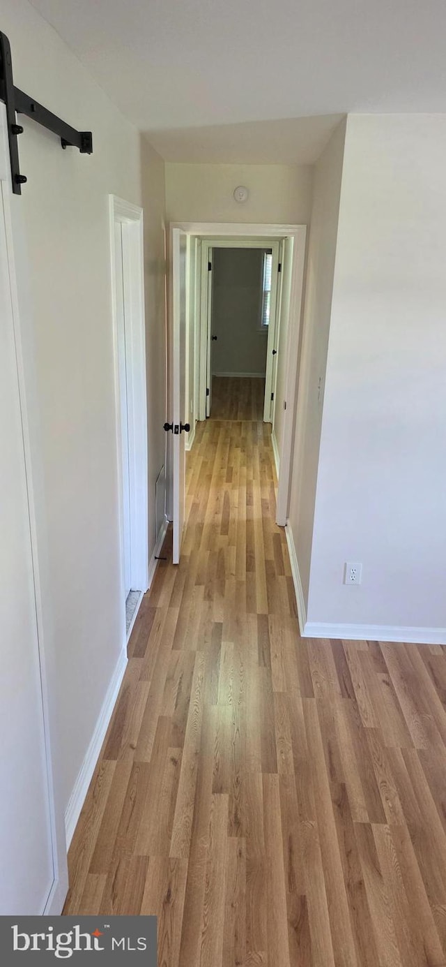 3478 Pence Ct, Annandale, VA 22003 - corridor featuring light wood-style flooring and baseboards