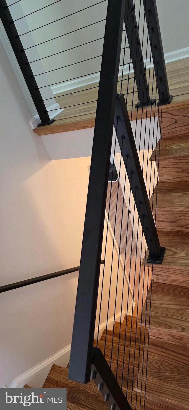 3478 Pence Ct, Annandale, VA 22003 - staircase featuring baseboards and wood finished floors