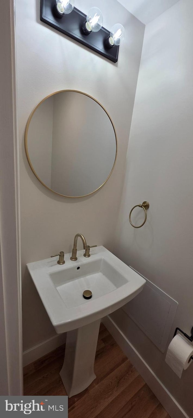3478 Pence Ct, Annandale, VA 22003 - bathroom with wood finished floors and a sink