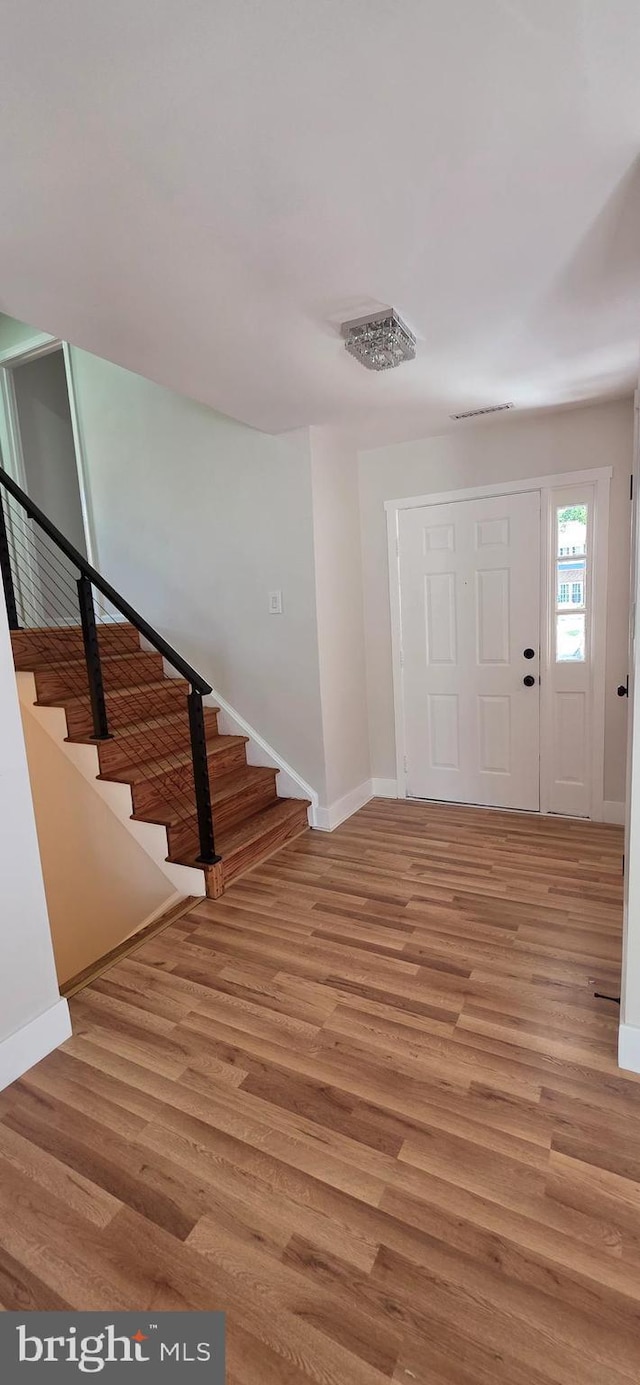 3478 Pence Ct, Annandale, VA 22003 - entrance foyer featuring light wood-type flooring and stairway