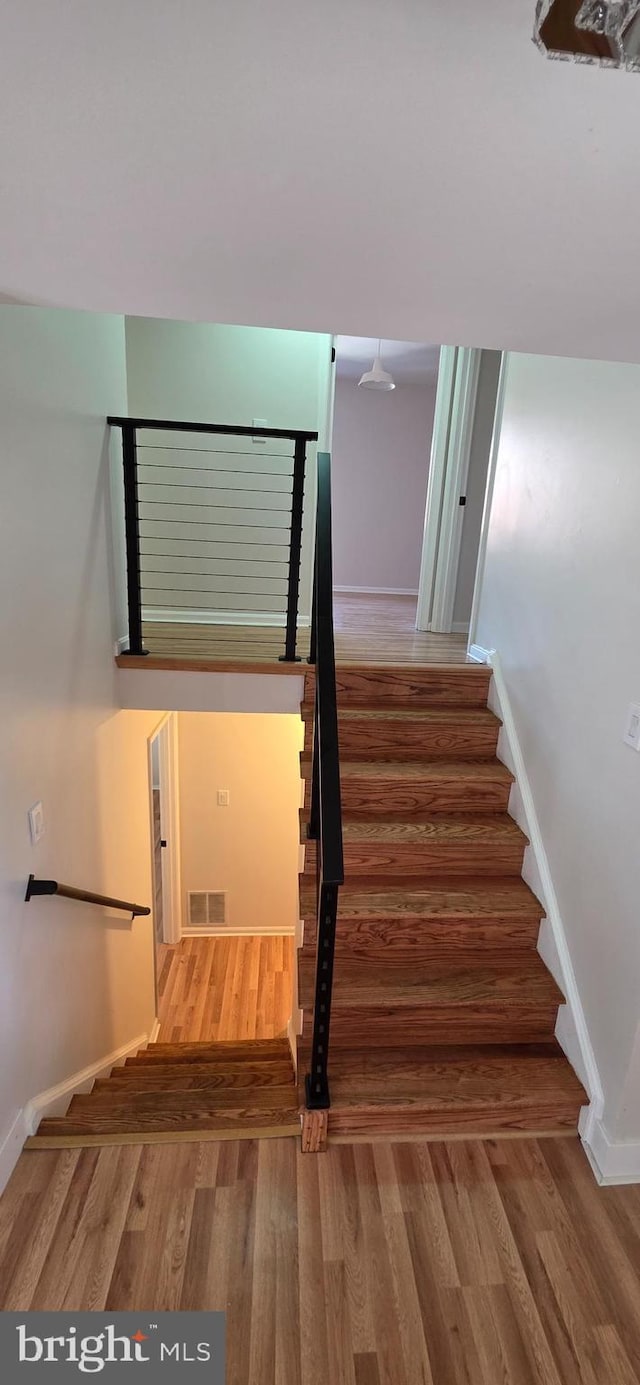 3478 Pence Ct, Annandale, VA 22003 - stairs with wood finished floors