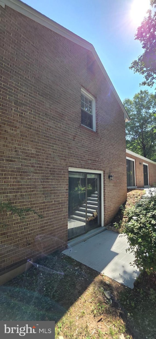 3478 Pence Ct, Annandale, VA 22003 - rear view of property featuring a patio and brick siding