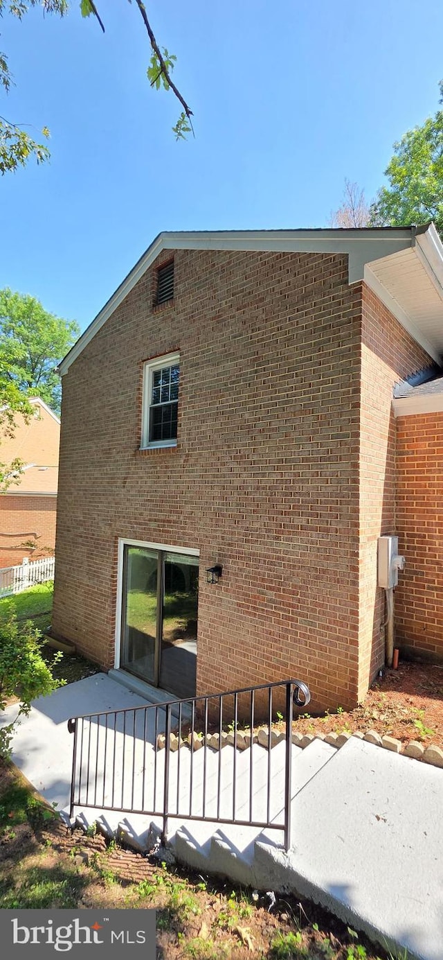 3478 Pence Ct, Annandale, VA 22003 - rear view of property with a patio and brick siding