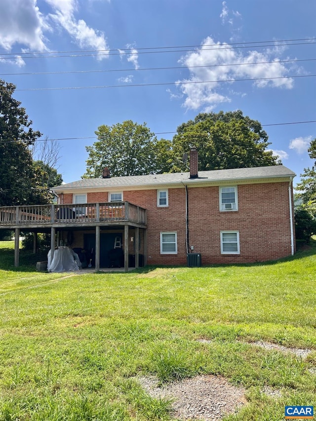 1410 Stevens Cove Rd, Lovingston, VA 22949 - back of property featuring a chimney, a wooden deck, and a lawn