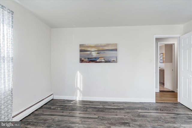 6934 River Drive Rd, Sparrows Point, MD 21219 - spare room featuring a baseboard radiator and wood finished floors