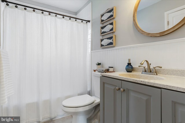 6934 River Drive Rd, Sparrows Point, MD 21219 - bathroom with a wainscoted wall, vanity, and shower / bathtub combination with curtain