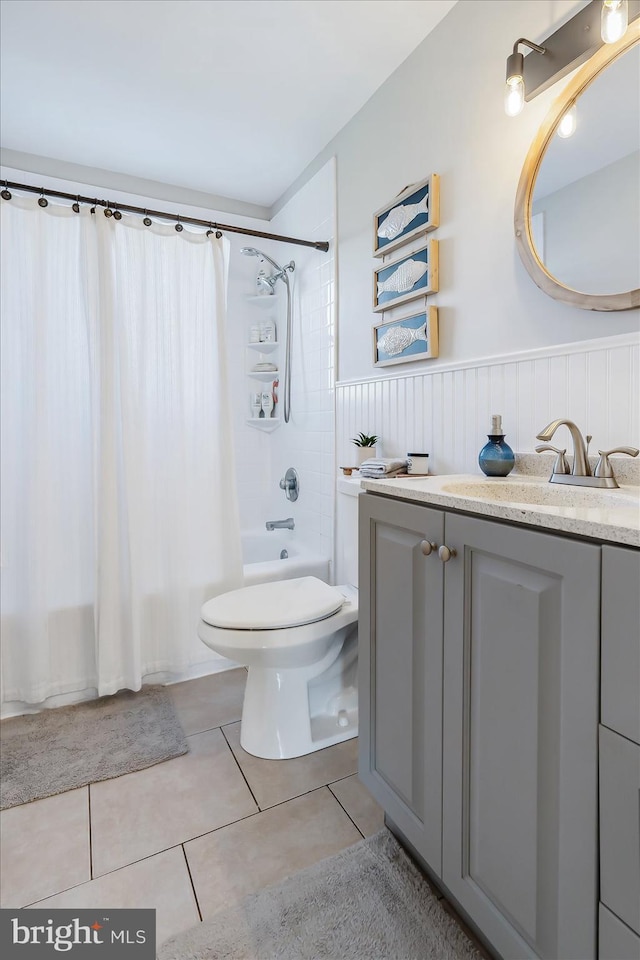 6934 River Drive Rd, Sparrows Point, MD 21219 - full bathroom with shower / tub combo with curtain, vanity, tile patterned floors, and wainscoting
