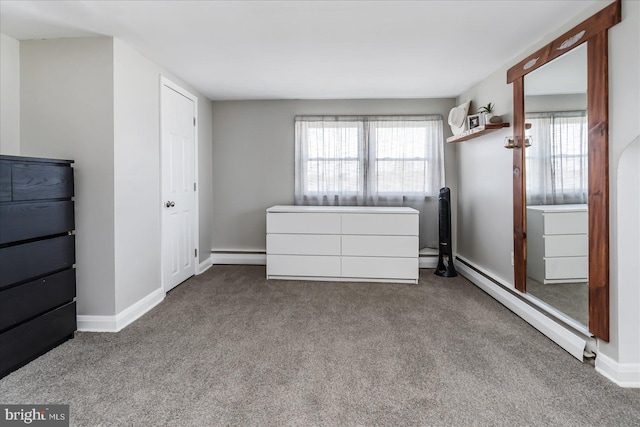 6934 River Drive Rd, Sparrows Point, MD 21219 - unfurnished bedroom with baseboard heating, multiple windows, carpet floors, and a baseboard radiator