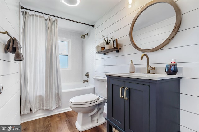 6934 River Drive Rd, Sparrows Point, MD 21219 - bathroom featuring vanity, shower / bath combination with curtain, wood finished floors, and wooden walls