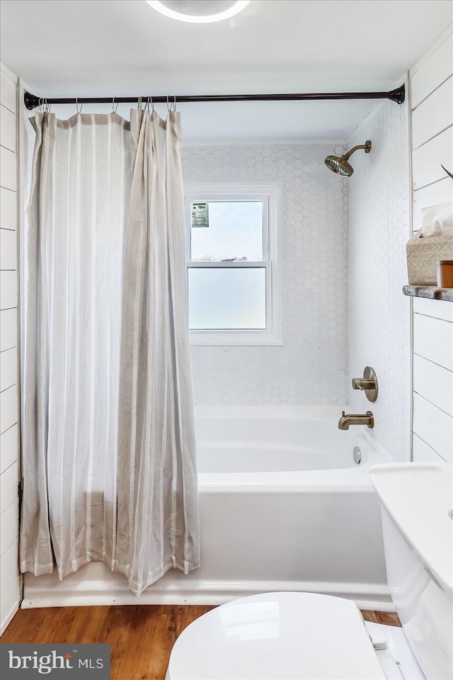 6934 River Drive Rd, Sparrows Point, MD 21219 - bathroom featuring shower / bath combo and wood finished floors
