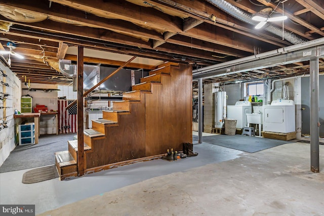 6934 River Drive Rd, Sparrows Point, MD 21219 - basement featuring independent washer and dryer, water heater, and stairway