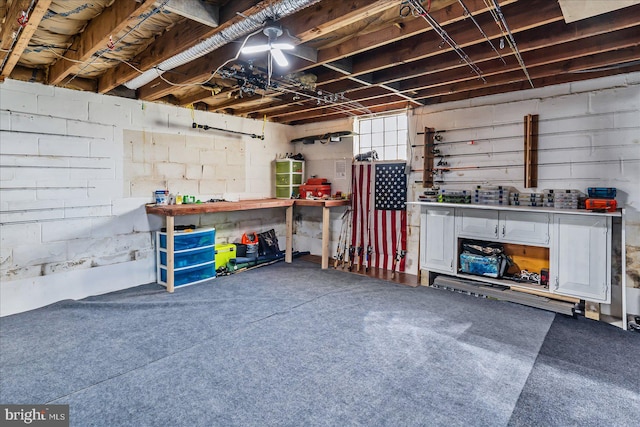 6934 River Drive Rd, Sparrows Point, MD 21219 - below grade area with a workshop area and concrete block wall