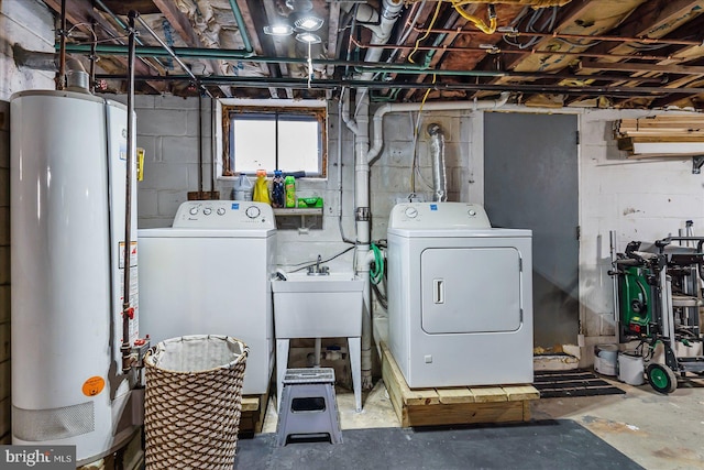 6934 River Drive Rd, Sparrows Point, MD 21219 - washroom with gas water heater and washer and dryer