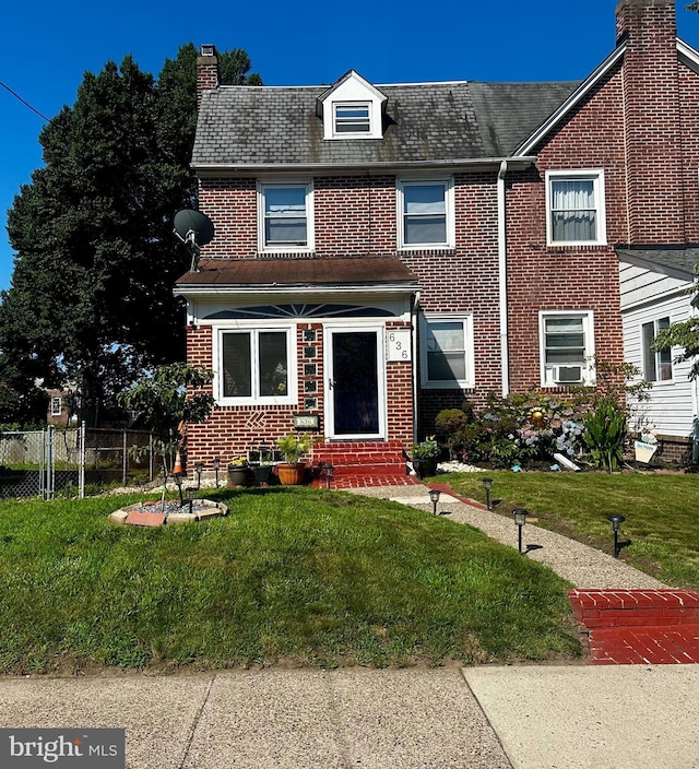 636 W 31st St, Wilmington, DE 19802 - view of front of house featuring a chimney, brick siding, entry steps, and cooling unit