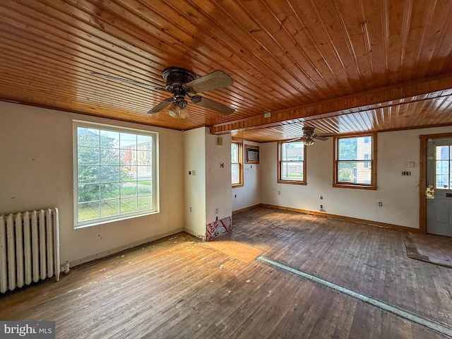 507 Market St, New Cumberland, PA 17070 - unfurnished living room featuring radiator heating unit, wood ceiling, a ceiling fan, wood-type flooring, and healthy amount of natural light
