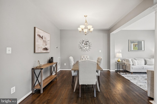 8562 Wyngate Manor Ct, Alexandria, VA 22309 - dining space featuring a chandelier and dark wood finished floors