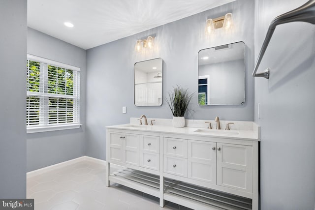 8562 Wyngate Manor Ct, Alexandria, VA 22309 - full bath with double vanity, tile patterned floors, and recessed lighting