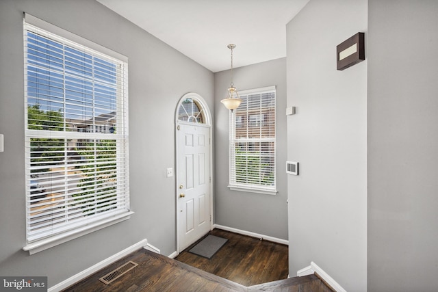 8562 Wyngate Manor Ct, Alexandria, VA 22309 - foyer entrance featuring dark wood finished floors and baseboards
