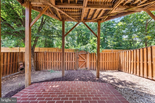 8562 Wyngate Manor Ct, Alexandria, VA 22309 - fenced backyard with a patio area and a gate