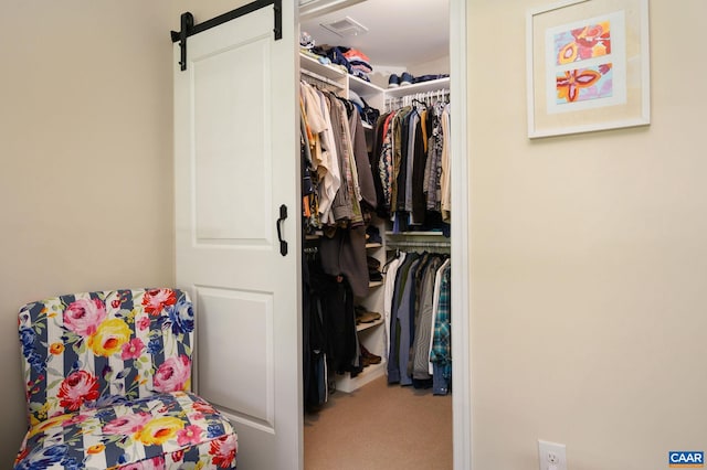 2127 Elm Tree Knl, Charlottesville, VA 22911 - spacious closet with carpet floors and a barn door