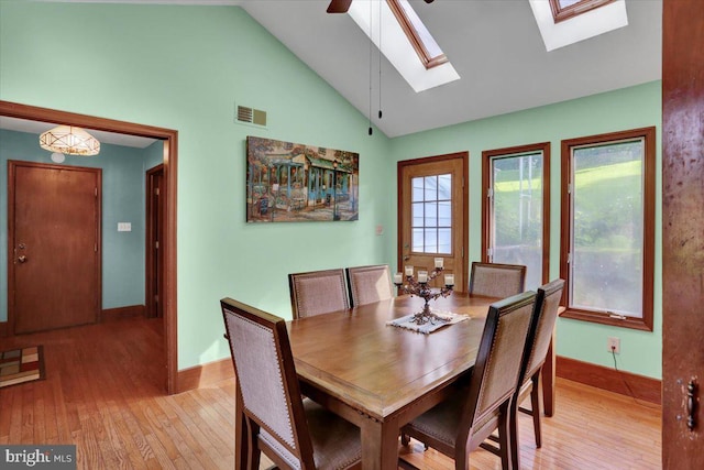 270 Gouglersville Rd, Reading, PA 19608 - dining area with light wood-style floors, a skylight, and high vaulted ceiling