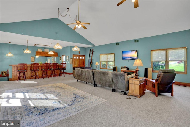 270 Gouglersville Rd, Reading, PA 19608 - carpeted living area with a ceiling fan, a bar, high vaulted ceiling, and plenty of natural light