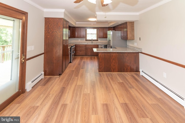 640 Bollinger Rd, Littlestown, PA 17340 - kitchen with a baseboard radiator, appliances with stainless steel finishes, a peninsula, ceiling fan, and crown molding