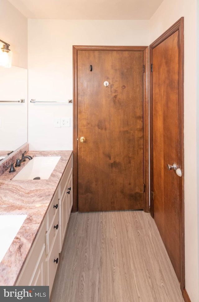640 Bollinger Rd, Littlestown, PA 17340 - bathroom featuring double vanity and wood finished floors
