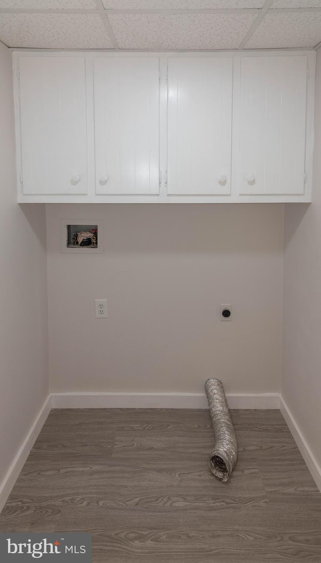 640 Bollinger Rd, Littlestown, PA 17340 - laundry room with hookup for an electric dryer, washer hookup, cabinet space, and dark wood-style flooring