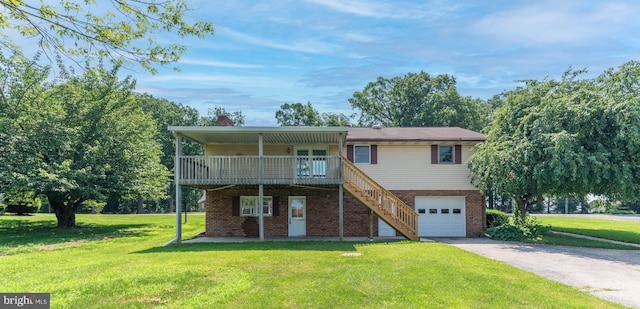 640 Bollinger Rd, Littlestown, PA 17340 - view of front facade featuring an attached garage, asphalt driveway, a front yard, and stairs