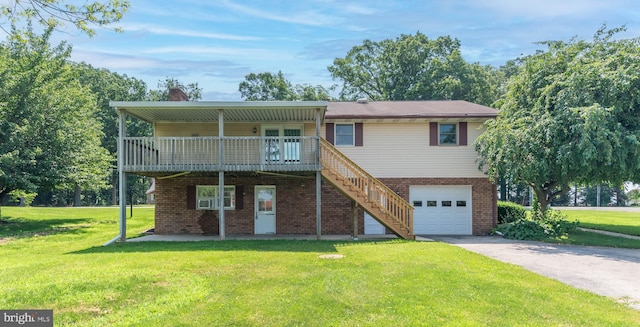 640 Bollinger Rd, Littlestown, PA 17340 - view of front of house featuring driveway, a garage, a front yard, and a chimney