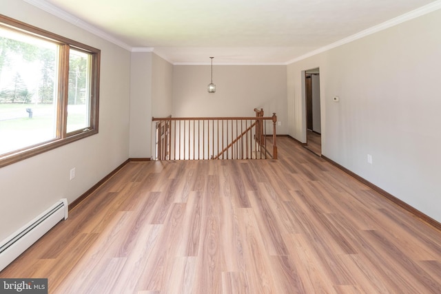 640 Bollinger Rd, Littlestown, PA 17340 - unfurnished room with a baseboard heating unit, light wood-type flooring, and crown molding