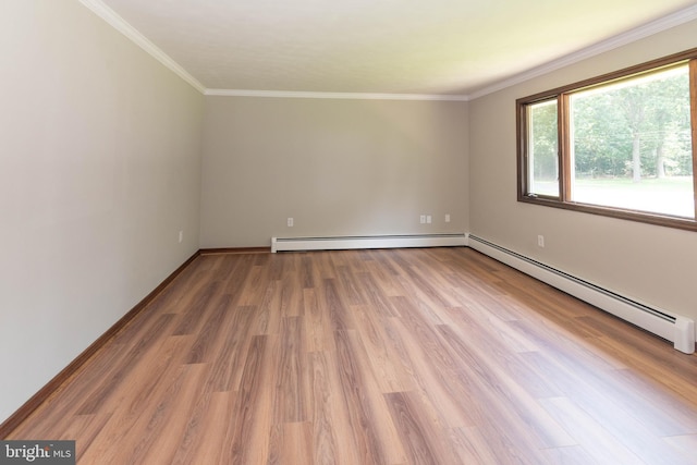 640 Bollinger Rd, Littlestown, PA 17340 - empty room with baseboard heating, wood finished floors, and crown molding