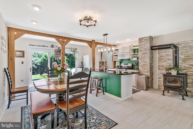 2090 Clearview Dr, Owings, MD 20736 - dining space featuring a wood stove and recessed lighting