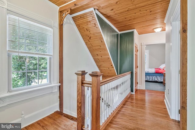 2090 Clearview Dr, Owings, MD 20736 - hall with light wood-style floors, wooden ceiling, an upstairs landing, and ornamental molding