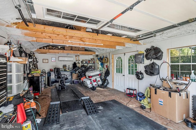 2090 Clearview Dr, Owings, MD 20736 - garage featuring a wall mounted air conditioner