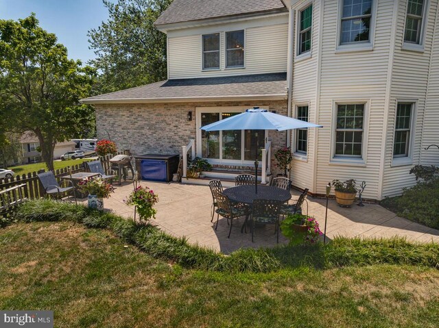 2090 Clearview Dr, Owings, MD 20736 - rear view of house featuring a patio area and roof with shingles