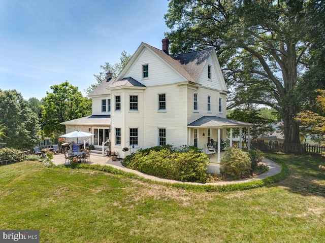 2090 Clearview Dr, Owings, MD 20736 - rear view of house featuring a patio area, a chimney, and entry steps