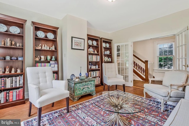2090 Clearview Dr, Owings, MD 20736 - sitting room featuring wood finished floors and stairs