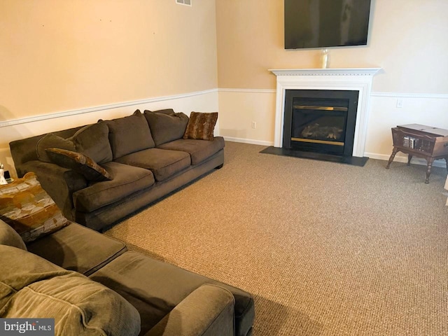 89 Wheeler Cir, Smyrna, DE 19977 - living room featuring carpet floors and a fireplace with flush hearth