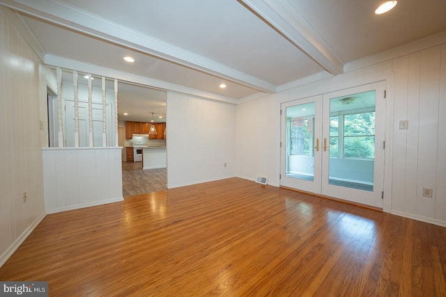 1420 E Boot Rd, West Chester, PA 19380 - spare room featuring wood finished floors, french doors, ornamental molding, beam ceiling, and recessed lighting