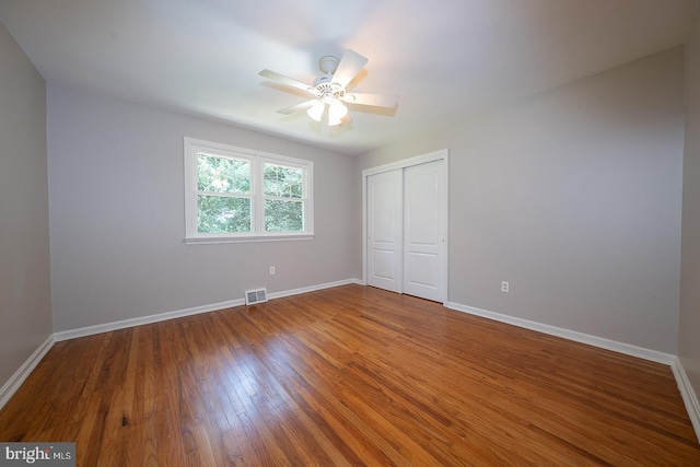 1420 E Boot Rd, West Chester, PA 19380 - unfurnished bedroom with a closet, wood finished floors, and a ceiling fan