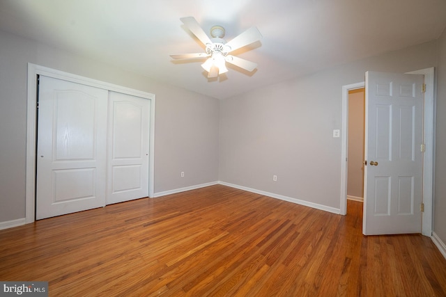 1420 E Boot Rd, West Chester, PA 19380 - unfurnished bedroom with light wood finished floors, a closet, and a ceiling fan