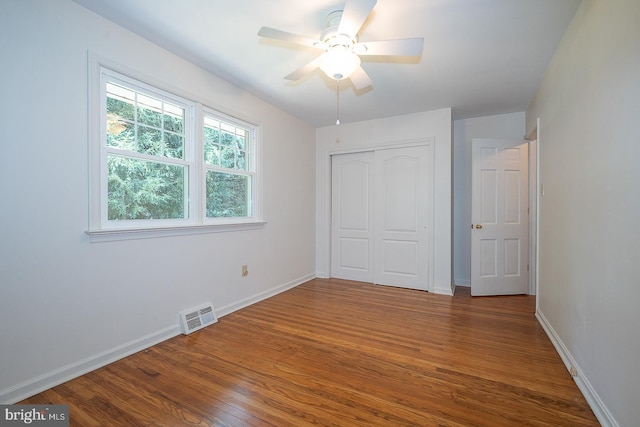 1420 E Boot Rd, West Chester, PA 19380 - unfurnished bedroom with wood finished floors, a closet, and ceiling fan