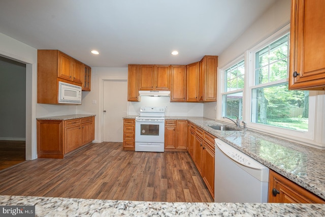 1420 E Boot Rd, West Chester, PA 19380 - kitchen featuring white appliances, dark wood-type flooring, under cabinet range hood, brown cabinets, and recessed lighting