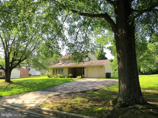 1208 Pickering Cir, Upper Marlboro, MD 20774 - view of front of property featuring driveway, a garage, and a front lawn