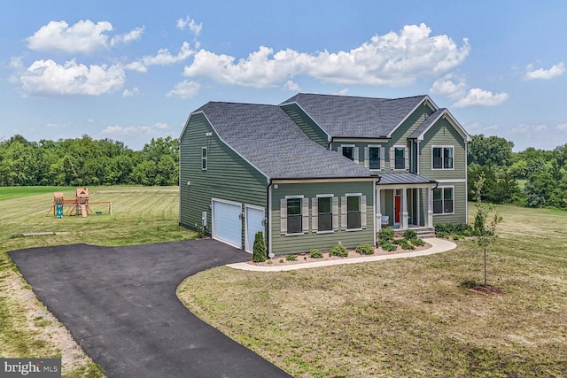 11100 Slate Landing Ln, Nokesville, VA 20181 - view of front of property featuring asphalt driveway, roof with shingles, a front yard, and a garage